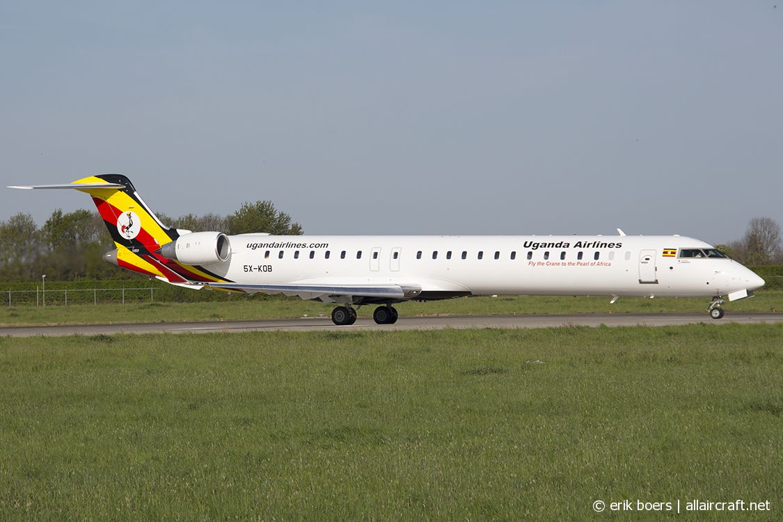 5X-KOB (cn 15457) Bombardier CRJ-900