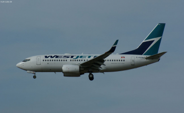 C-FEWJ · Boeing 737-7CT(WL) · (YYC / CYYC)