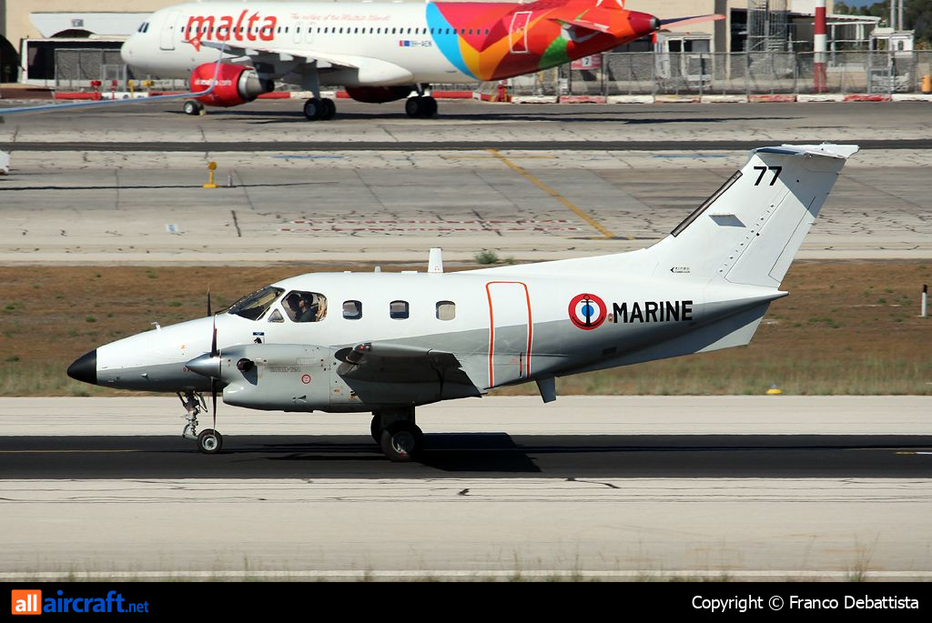 77 · Embraer EMB-121AN Xingu · (MLA / LMML)