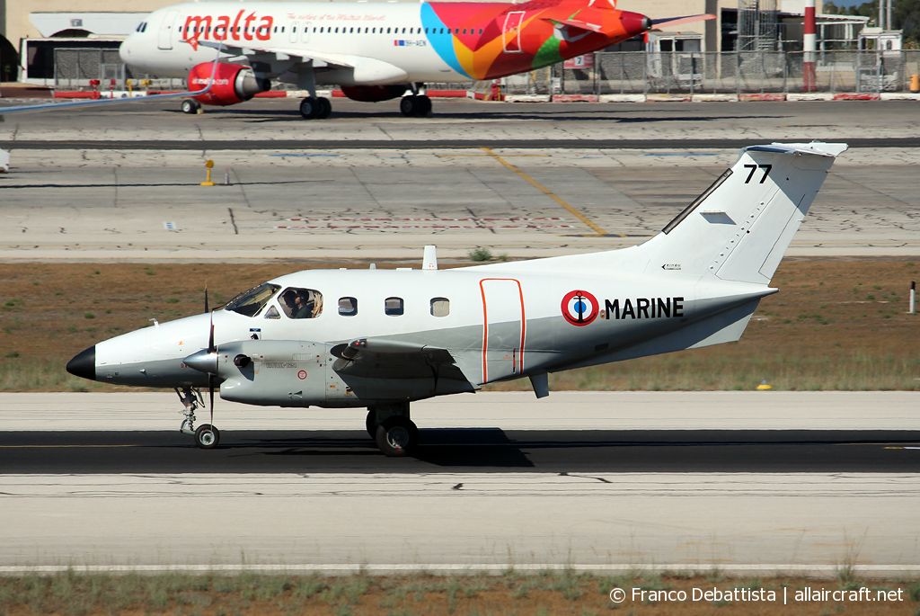 77 · Embraer EMB-121AN Xingu · (MLA / LMML)