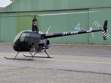 OY-HHE · Robinson R22 Beta · (RKE / EKRK)